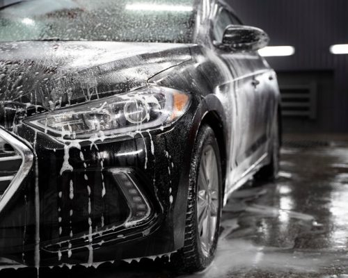 beautiful-car-washing-service_23-2149212221