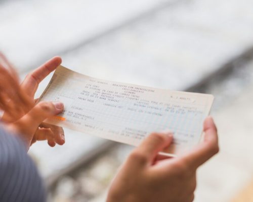 female-tourist-waiting-train_23-2147981865